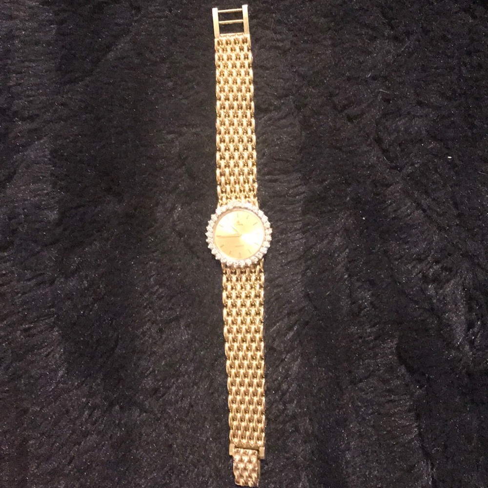 Cyma 14k gold watch